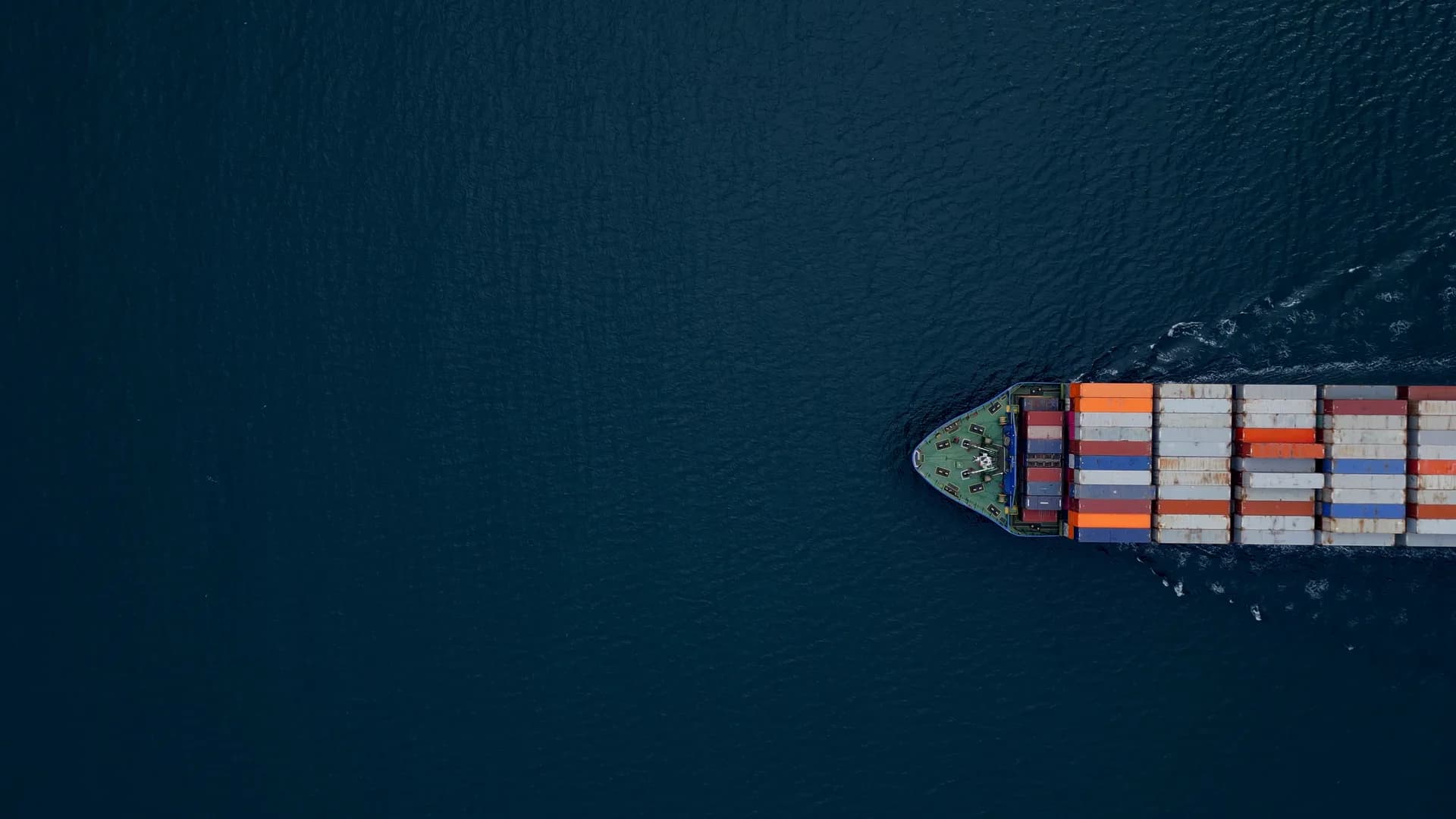 Aerial view of a container ship crossing the open sea